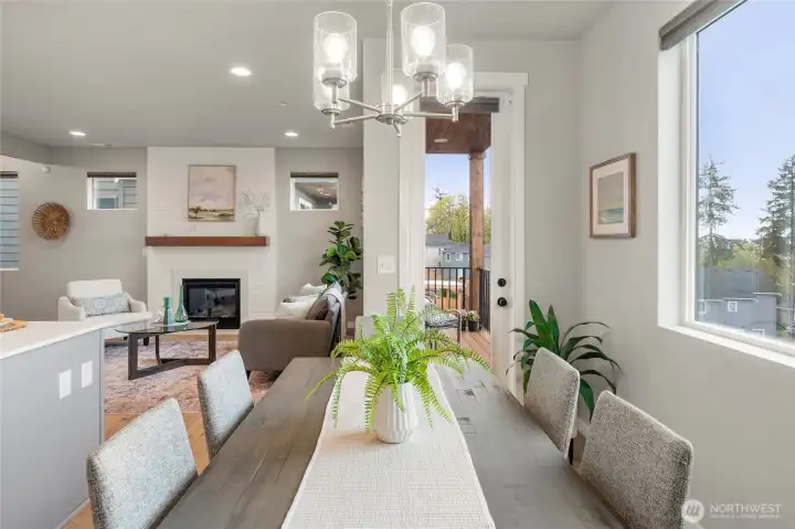 Dining area opens onto deck.