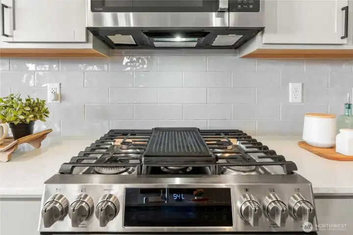 Subway-tile backsplash and a gas range for the gourmand.