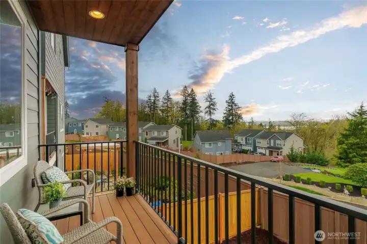 The west-facing deck is the perfect place to unwind and enjoy the sunset.