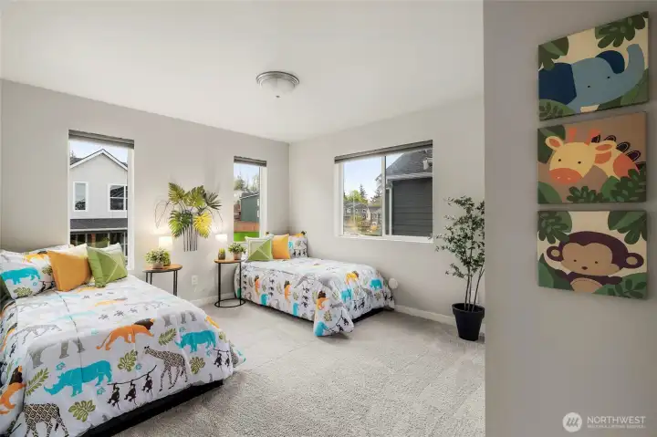 Northeast bedroom, is one of three on the second floor, one of which also has a walk-in closet.