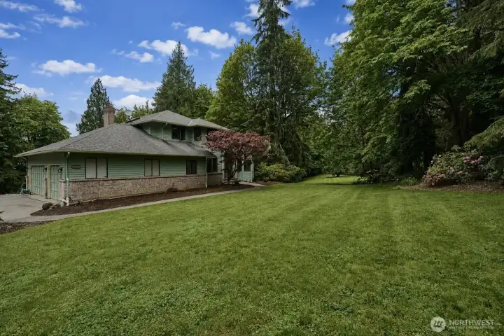 Park like private setting on almost 5 acres