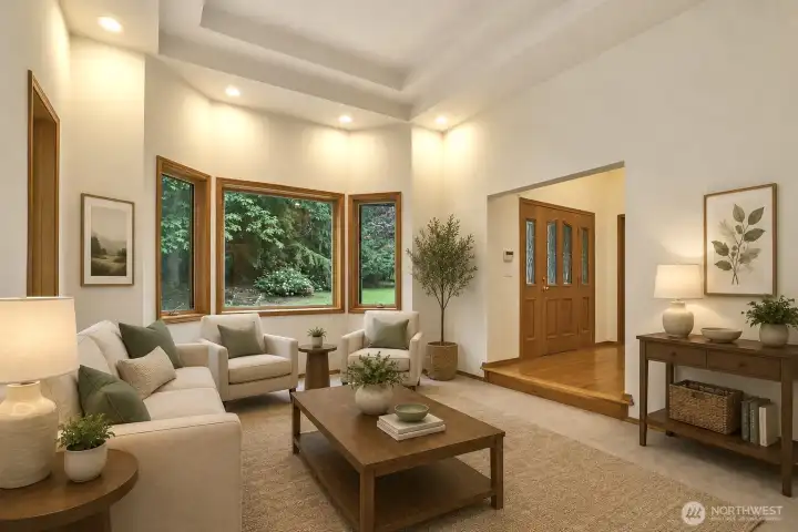 Virtually staged formal living room. Bay window