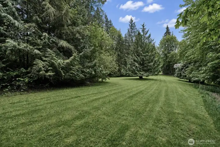 Park like private setting on almost 5 acres