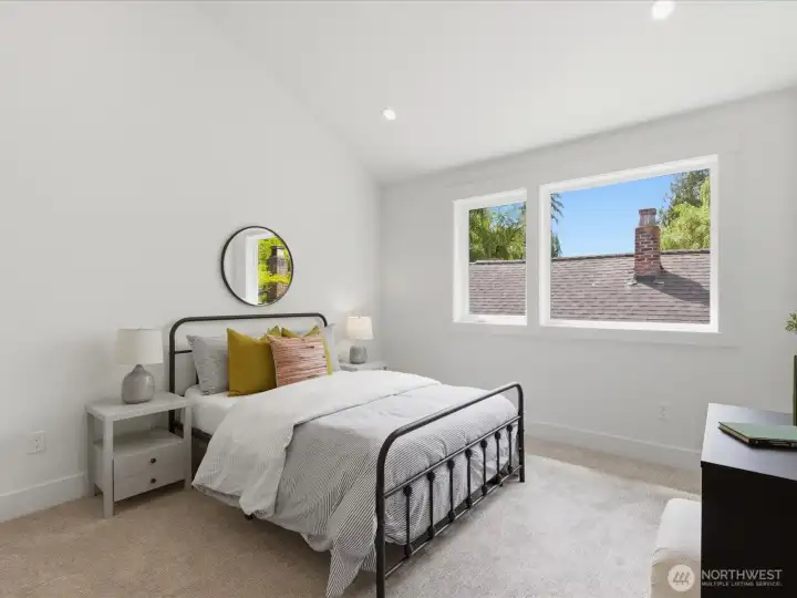 Generous vaulted ceilings in secondary bedroom