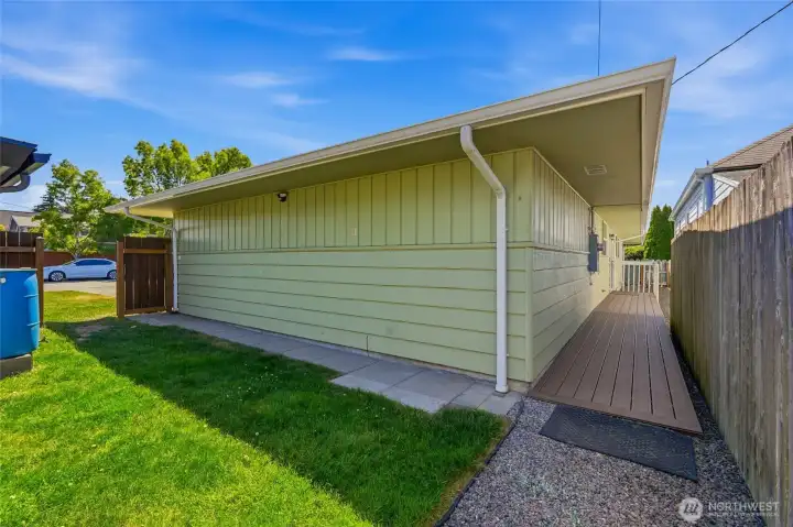 The private back deck creates a wonderful outdoor extension of the home. It is an ideal spot for morning coffee, summer dinners, or simply enjoying the fresh air.
