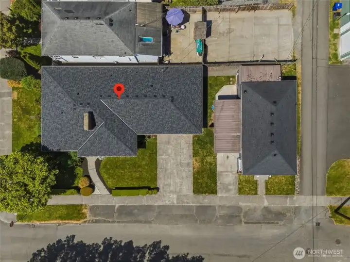 This combination of garage and driveway parking is a valuable feature in the neighborhood.