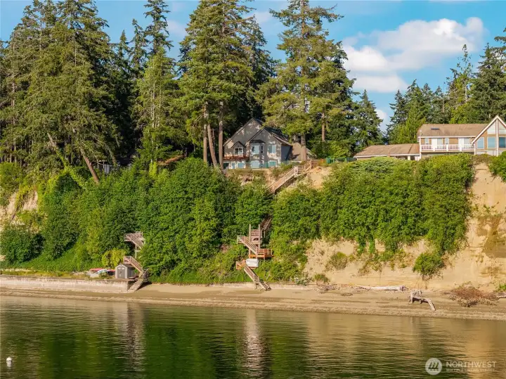 Waterfront with deeded tidelands is accessible by the staircase. Waterfront with deeded tidelands is accessible by the staircase.
