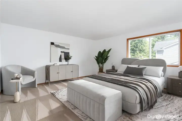 Primary bedroom accommodates large-scale furniture