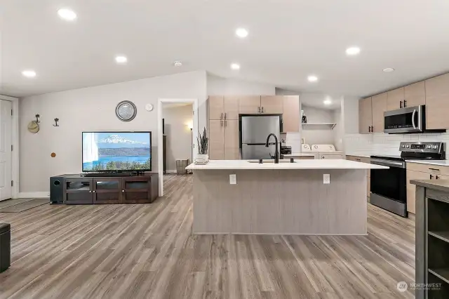 Open concept floor plan, seamlessly combines living room, dining room and kitchen.