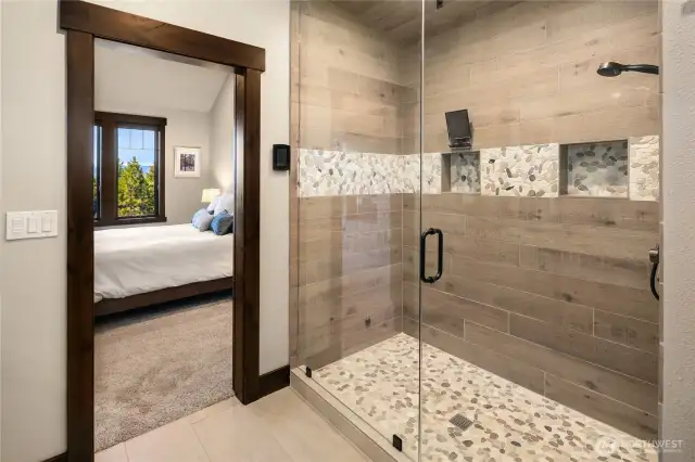 Huge steam shower and heated floors.