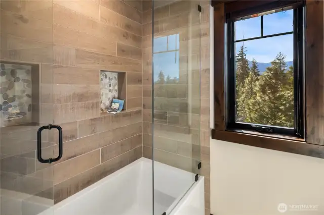 Deep soak bath with lovely territorial views.