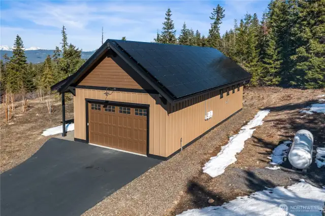 Here is the dream spot to keep all your toys in this heated 1008 square foot workshop/detached garage with over $60,000 of solar panels that provide year round electricity to the property.