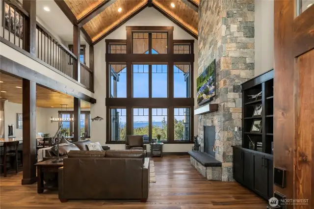 Cathedral ceilings with a 2 story wall of windows facing the mountains.