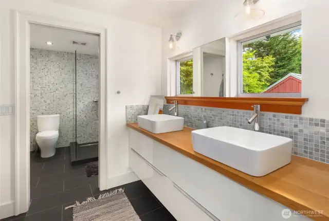 3/4 bathroom with heated floors on upper floor.