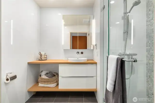 2nd 3/4 bathroom on main level with easy  access from the outdoor pool.