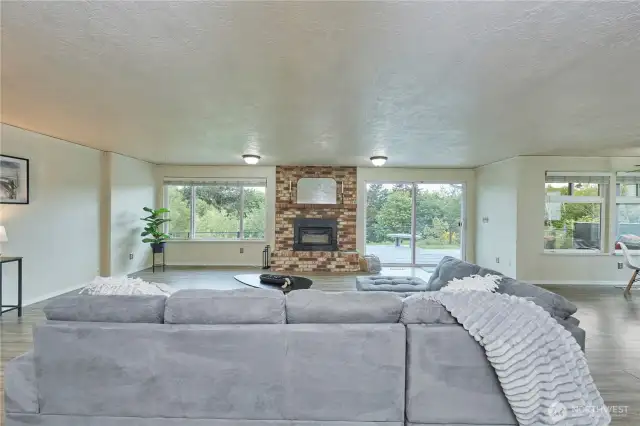 Can you picture resting on your sofa and enjoying the beauty out the rear windows?