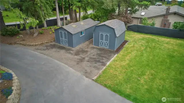 Two out buildings for whatever your outside needs are...