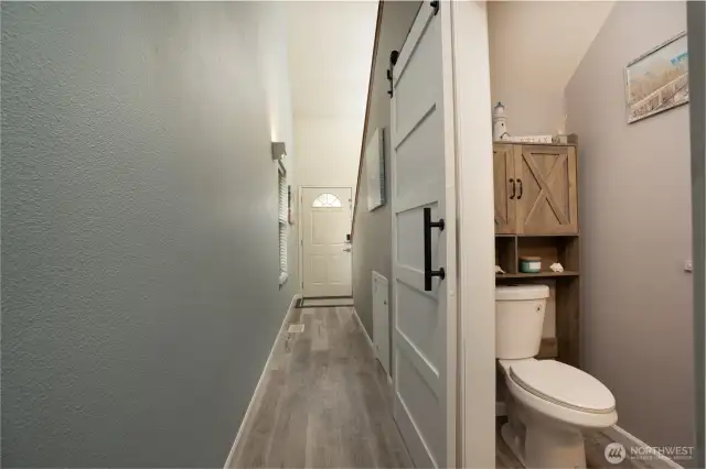 hall to living and half bath