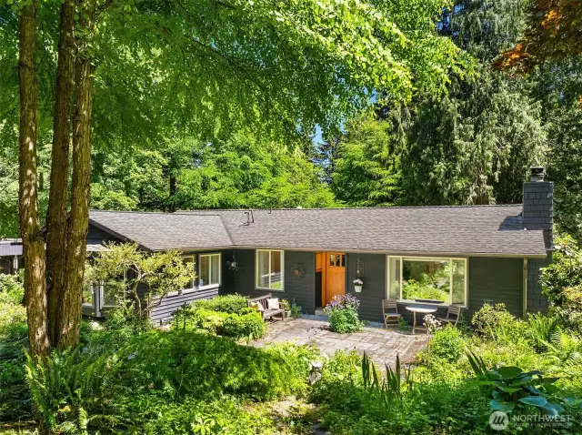 Welcome to your own santuary! Charming rambler nestled on 4.12 private and lush acres with pond.