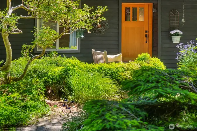 Established drought tolerant yard with a variety of trees, shrubs and perrenia;s.  Easy care with irrigation from seasonal pond.