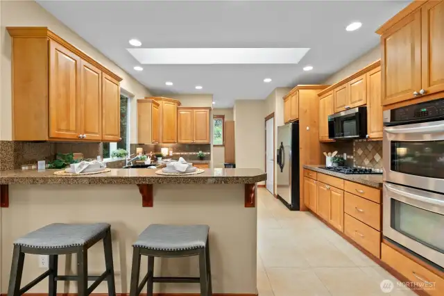 Open concept kitchen and dining, perfect for entertaining