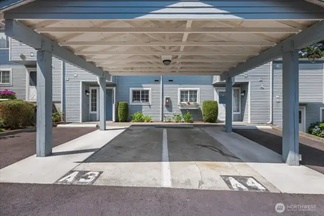 In front covered carport.  A3