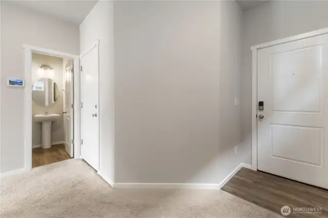 Entry, garage access and half bath.