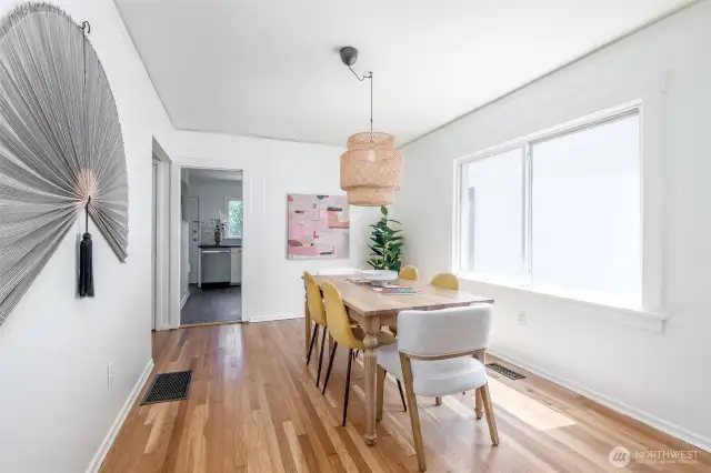 Picture yourself enjoying a meal with friends in this bright dining room!