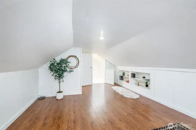 There is plenty of space in this primary bedroom for additional storage or a sitting area.