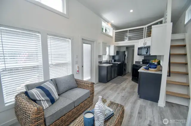 LIVING ROOM, KITCHEN, STAIRS TO THE LOFT