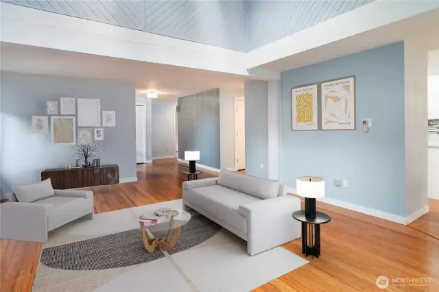 The main living space has vaulted ceilings with diagonal ship lap, wood beams, newer bamboo floors and warmth throughout. Virtually staged, the next photo will show you this room without furnishings.