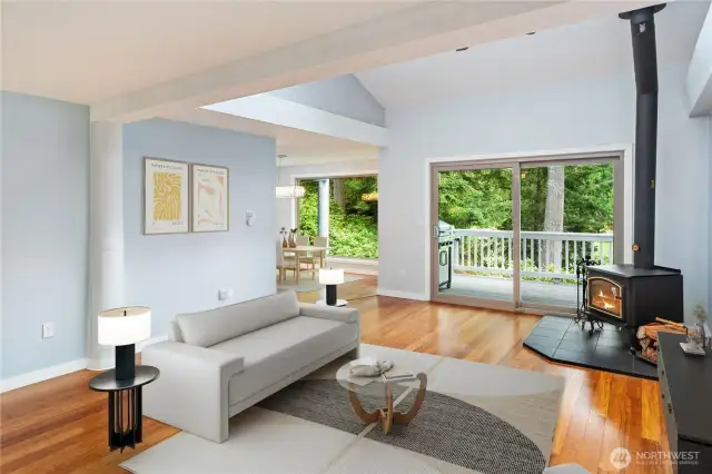 The sellers replaced the sliding door five years ago, and the installed a larger, triple-pane window in the dining room. The door and window are of quality and bring in the natural light and beautiful wooded golf course views.