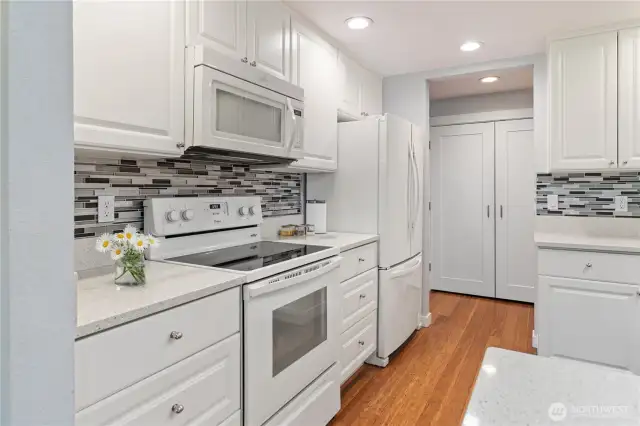 You'll love this beautiful, functional, quality kitchen with quartz cabinets, newer quality appliances, bamboo floors and much more!