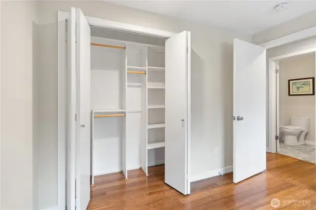 The custom closet in the guest bedroom is very functional. Across the hallway is the full guest bathroom.
