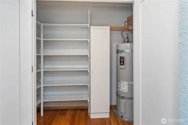 The large hallway closet can be a pantry, linen closet, or whatever you like. The hot water tank is properly strapped and easy to reach.