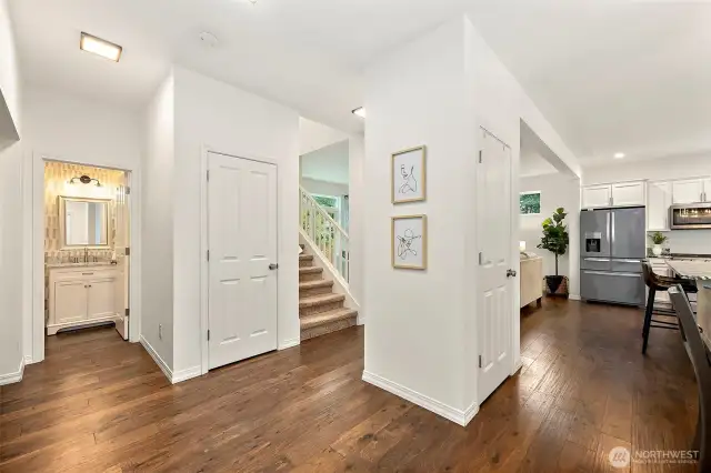 View from entry area into main living space. Just look at these gorgeous gleaming floors!