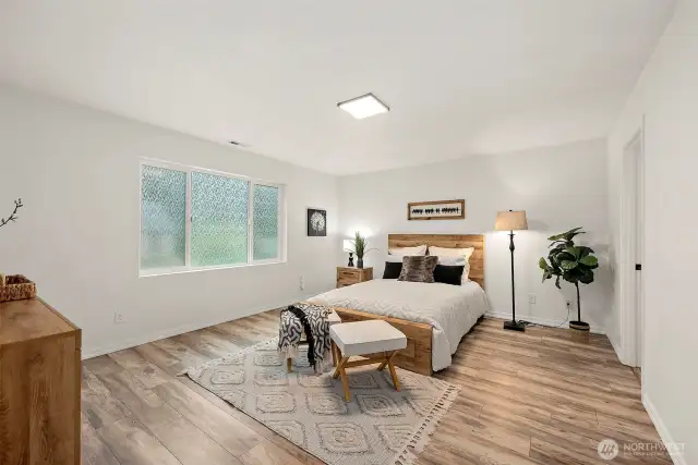 Upstairs spacious primary suite retreat. Window film is removeable.