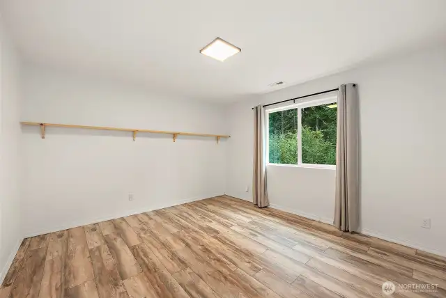 Upstairs bedroom 2, view to backyard.