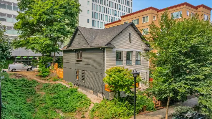 Existing 2 & 1/2 story with basement, updated 4-Plex with mixed-use zoning allows residential and/or commercial opportunities