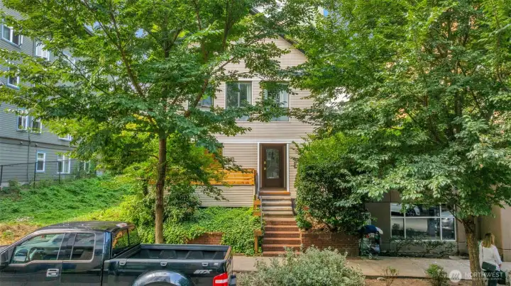 The updated multi-family is fully rented with light-filled, spacious remodeled apartments--each with its own patio/balcony-- five rentable surface parking spaces, and onsite storage units in basement