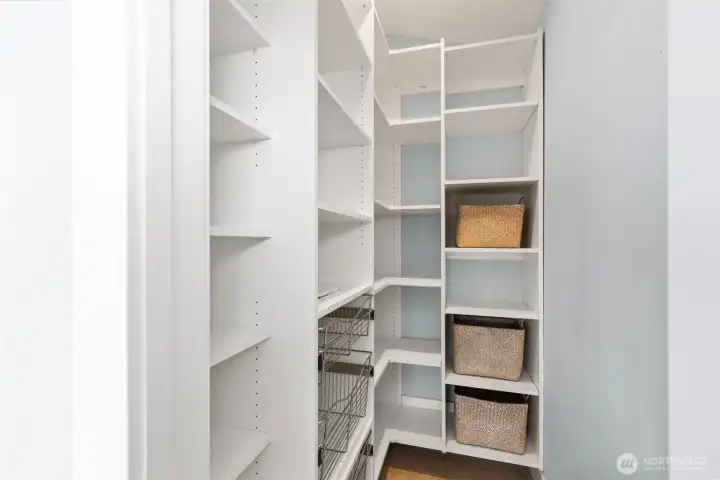 Walk-In Pantry – Generous storage with built-in shelving and organization, conveniently located just off the kitchen.