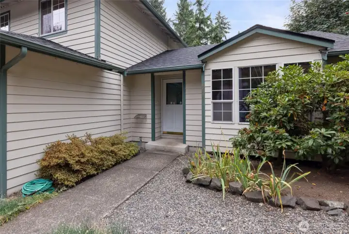 Mature landscaping with something always in bloom!