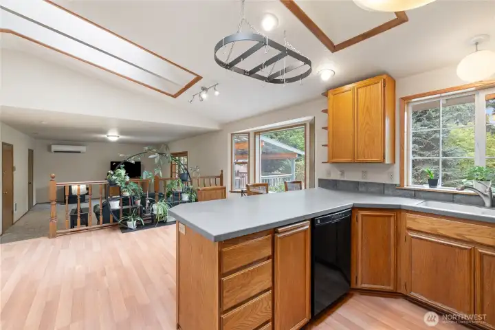 From the kitchen, looking towards the dining room and family room.