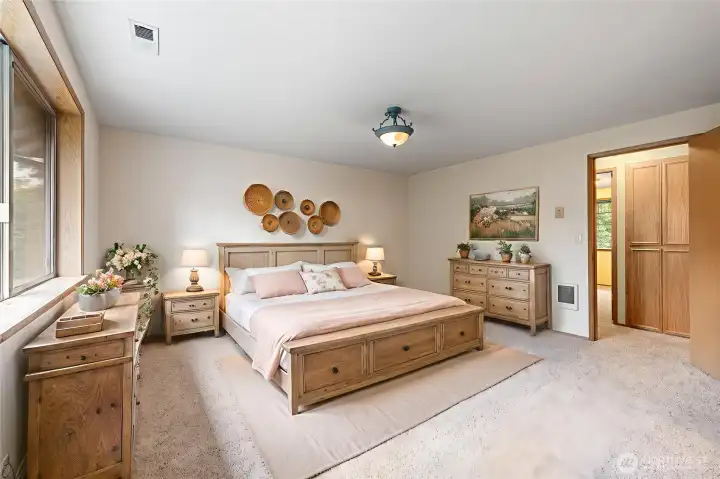 Primary bedroom is virtually staged.