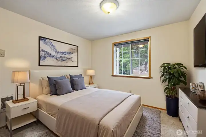 Bedroom is virtually staged.