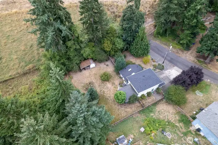 The back yard is fully fenced and the side yard is fenced separately and could be a dog run.
