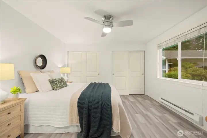 Primary bedroom with dual closets