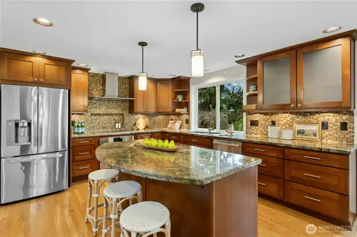 Beautifully updated kitchen with granite countertops and tile backsplash
