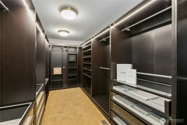 Large custom walk-in closet with custom built-ins