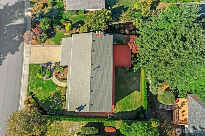 Flat large lot with mature landscaping